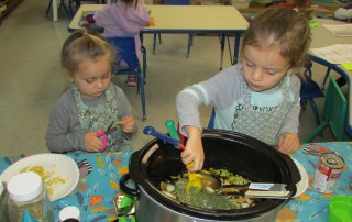 Brookeside students making soup from garden vegetables